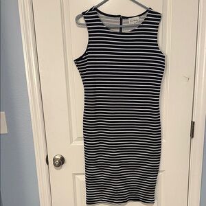Olivia Matthew’s Navy and White Striped Midi Dress